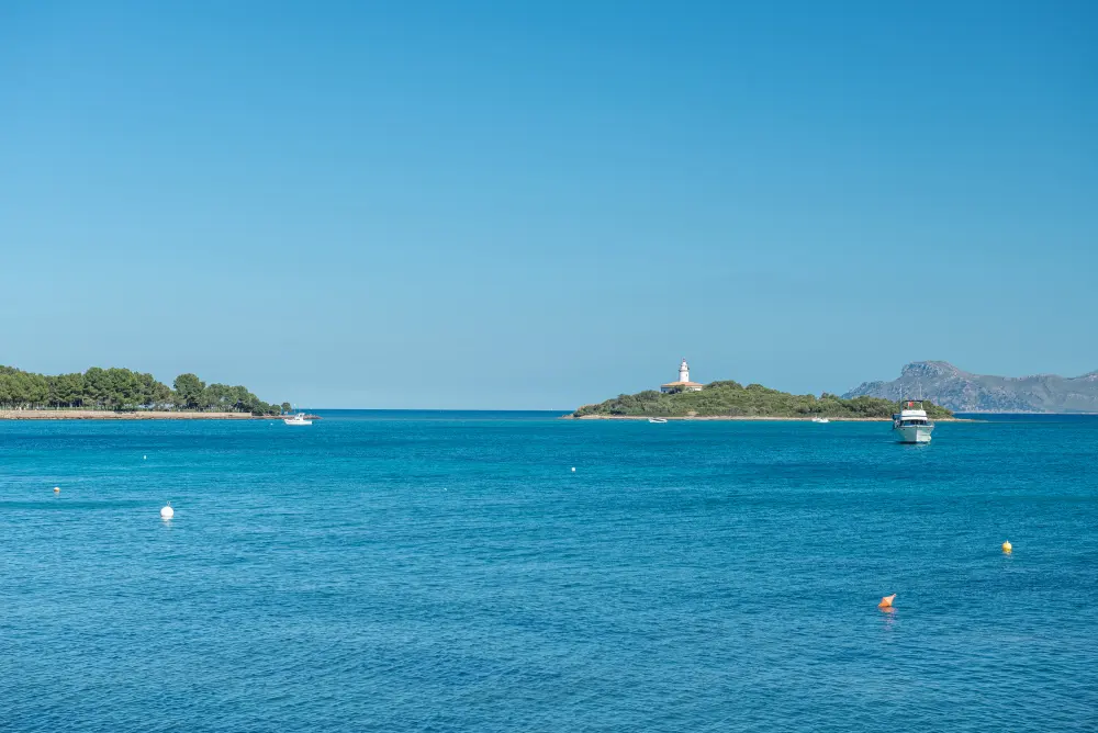 Lighthouse and bay near Alcanada in Mallorca